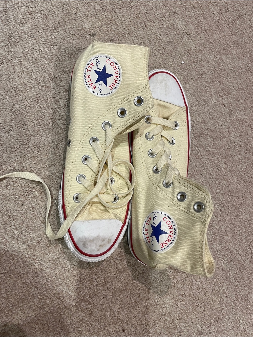 Converse All Stars High Tops in Cream